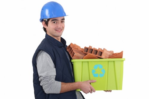 Professional team assessing house clearance in Hainault